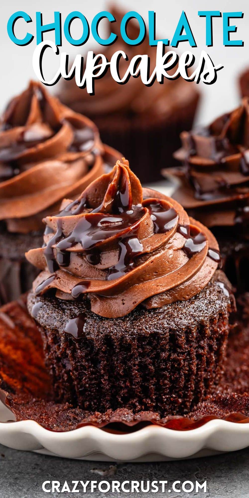 unwrapped cupcake with chocolate frosting and chocolate sauce drizzled over top with words on the image.
