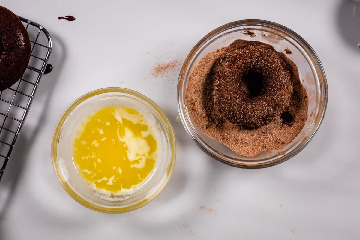 process shot of chocolate donuts being made.