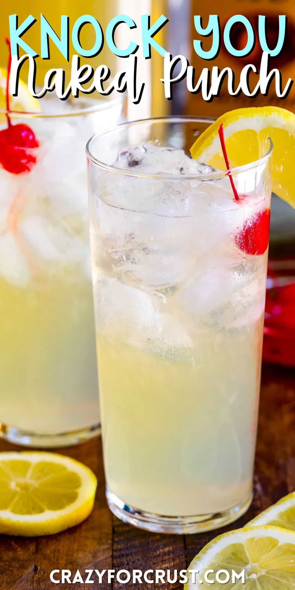 yellow party punch in a tall clear class with a cherry and lemon slice on the rim with words on the image.