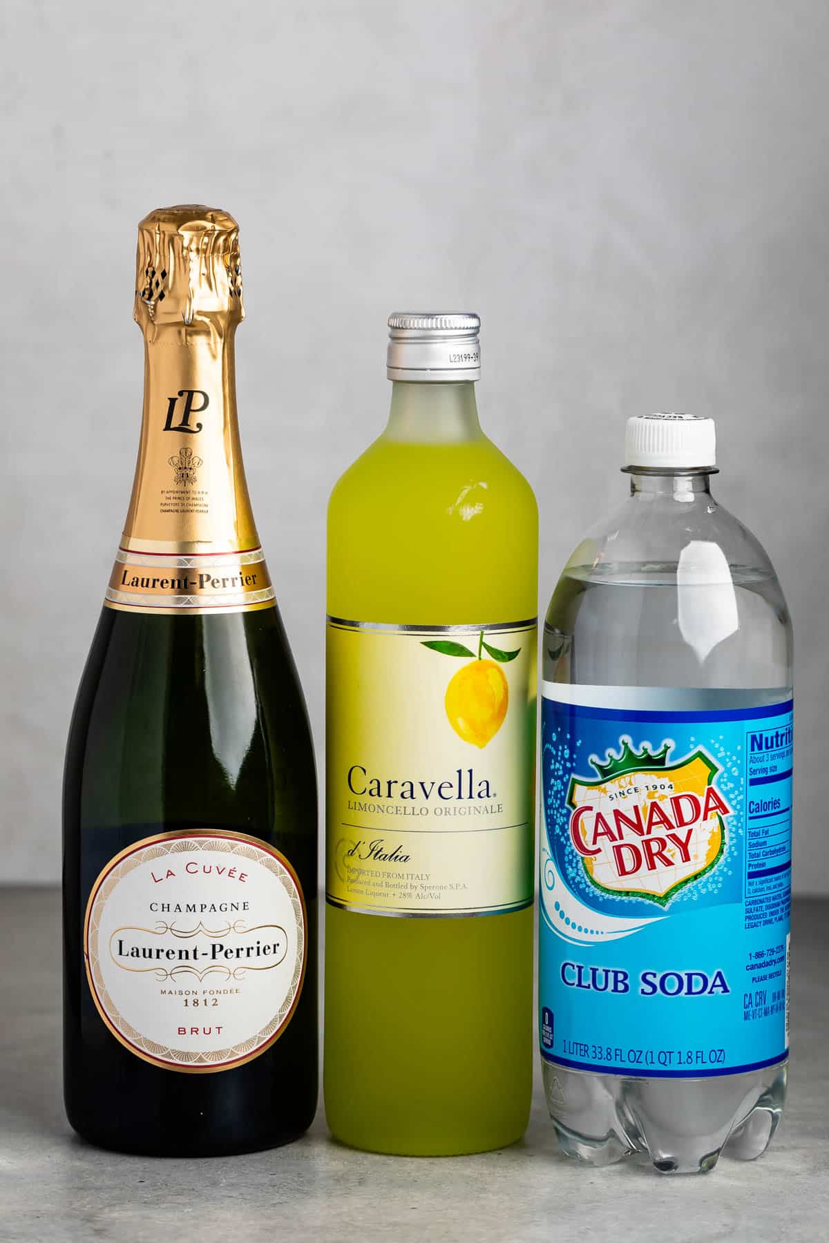 ingredients in lemon fizz drink laid out next to each other.