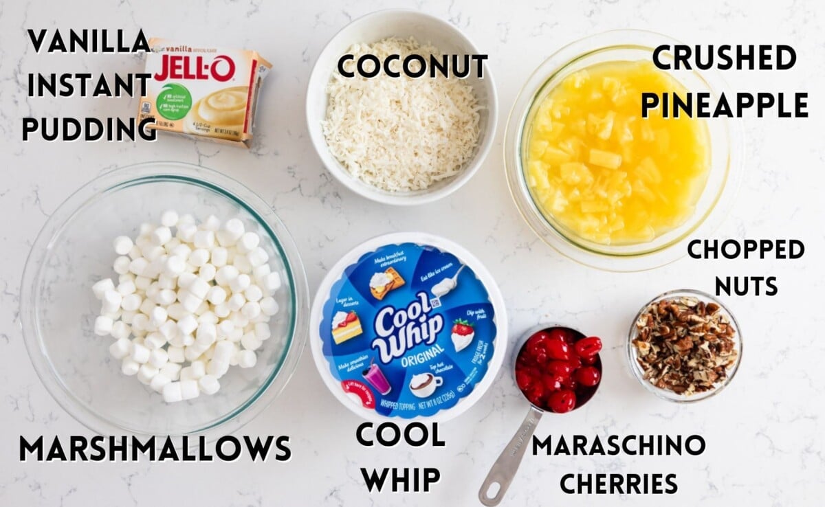 ingredients in pineapple fluff laid out on a marble counter.