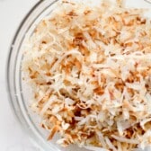 shredded coconut in a clear bowl.