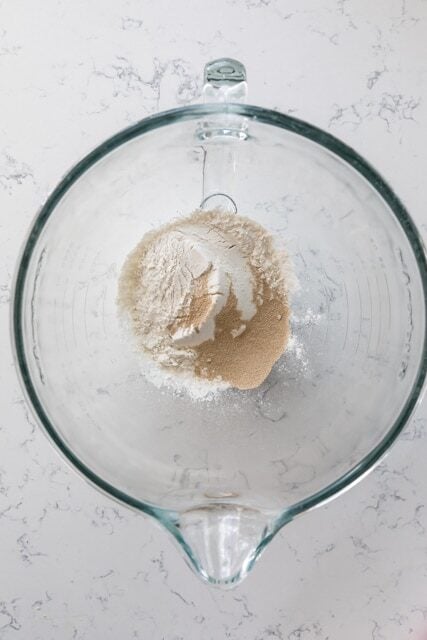 flour and yeast in mixing bowl.