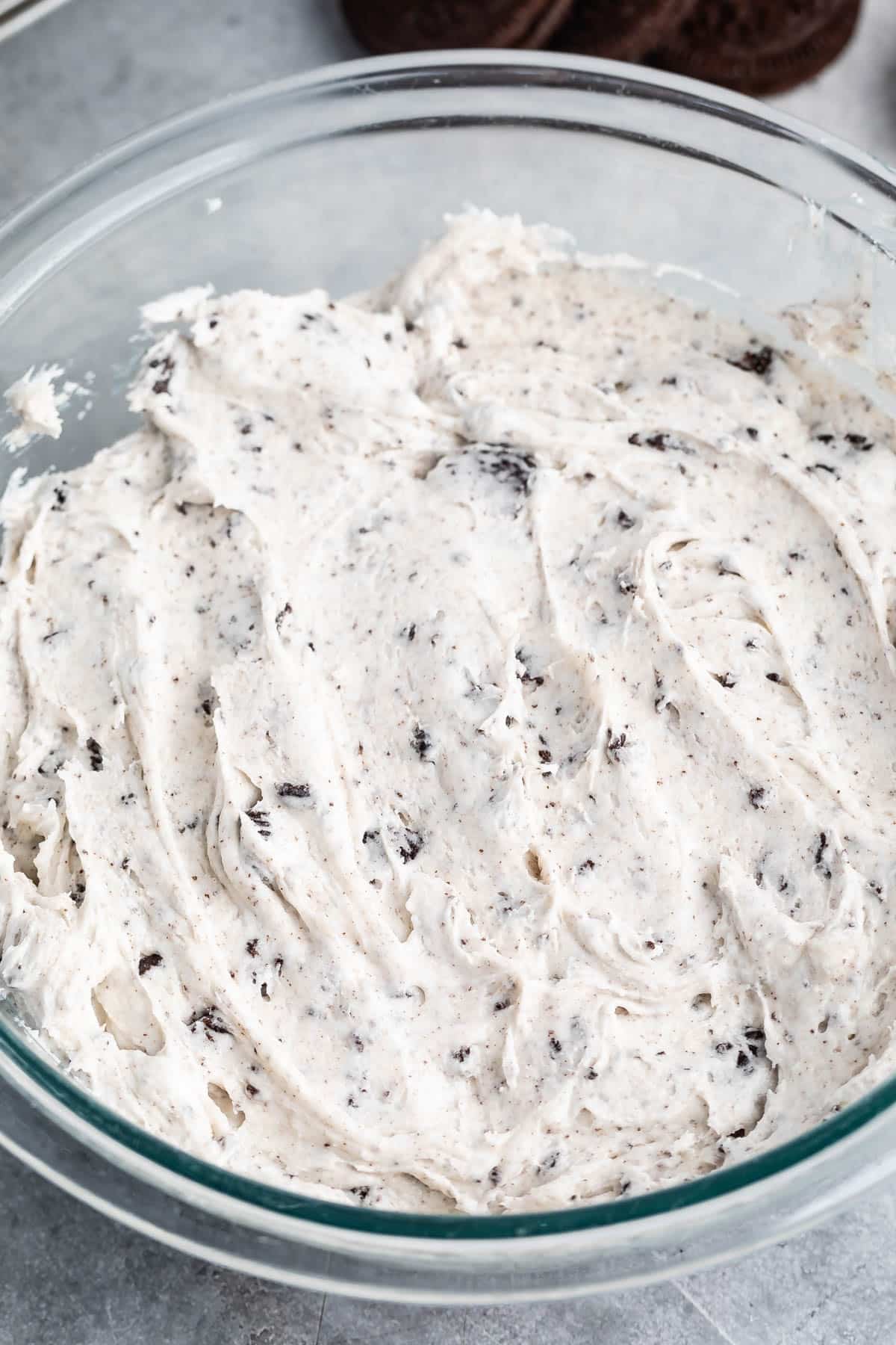 oreo frosting held in a clear bowl.