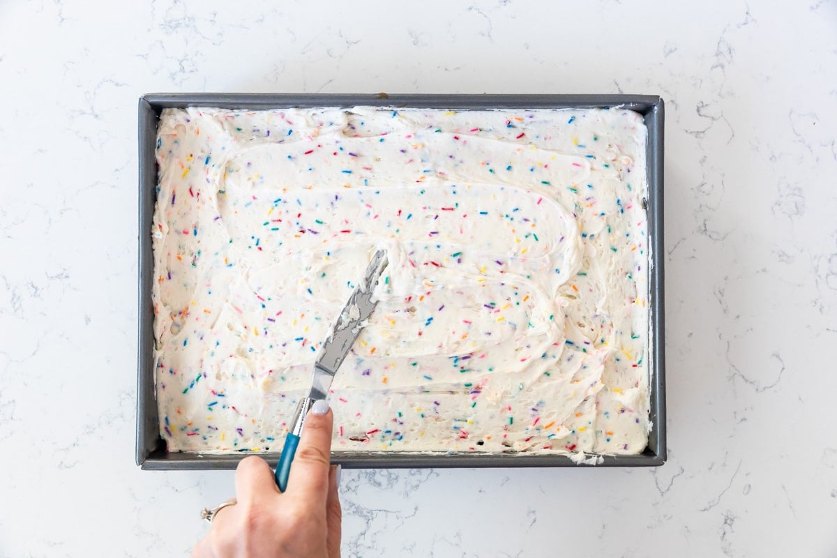 process shot of funfetti cake being made.