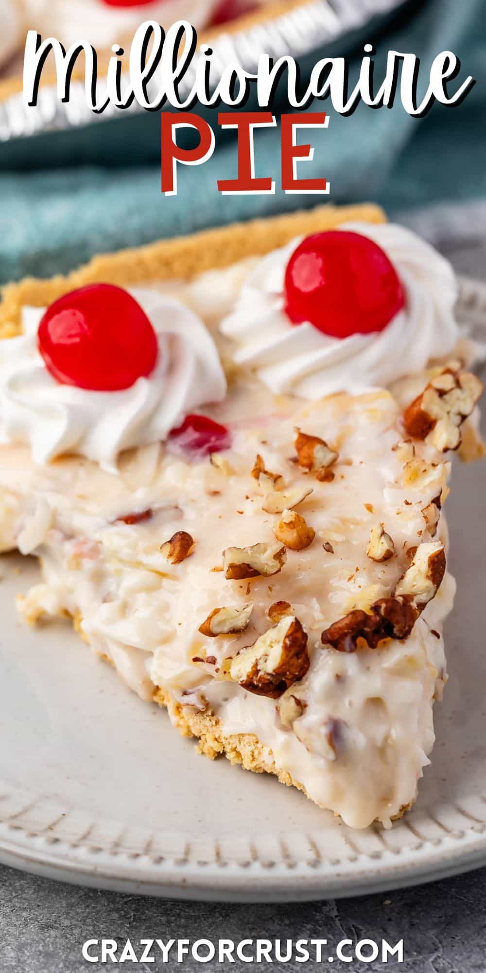 slice of millionaire pie on a grey plate with pecans and cherries on top with words on the image.