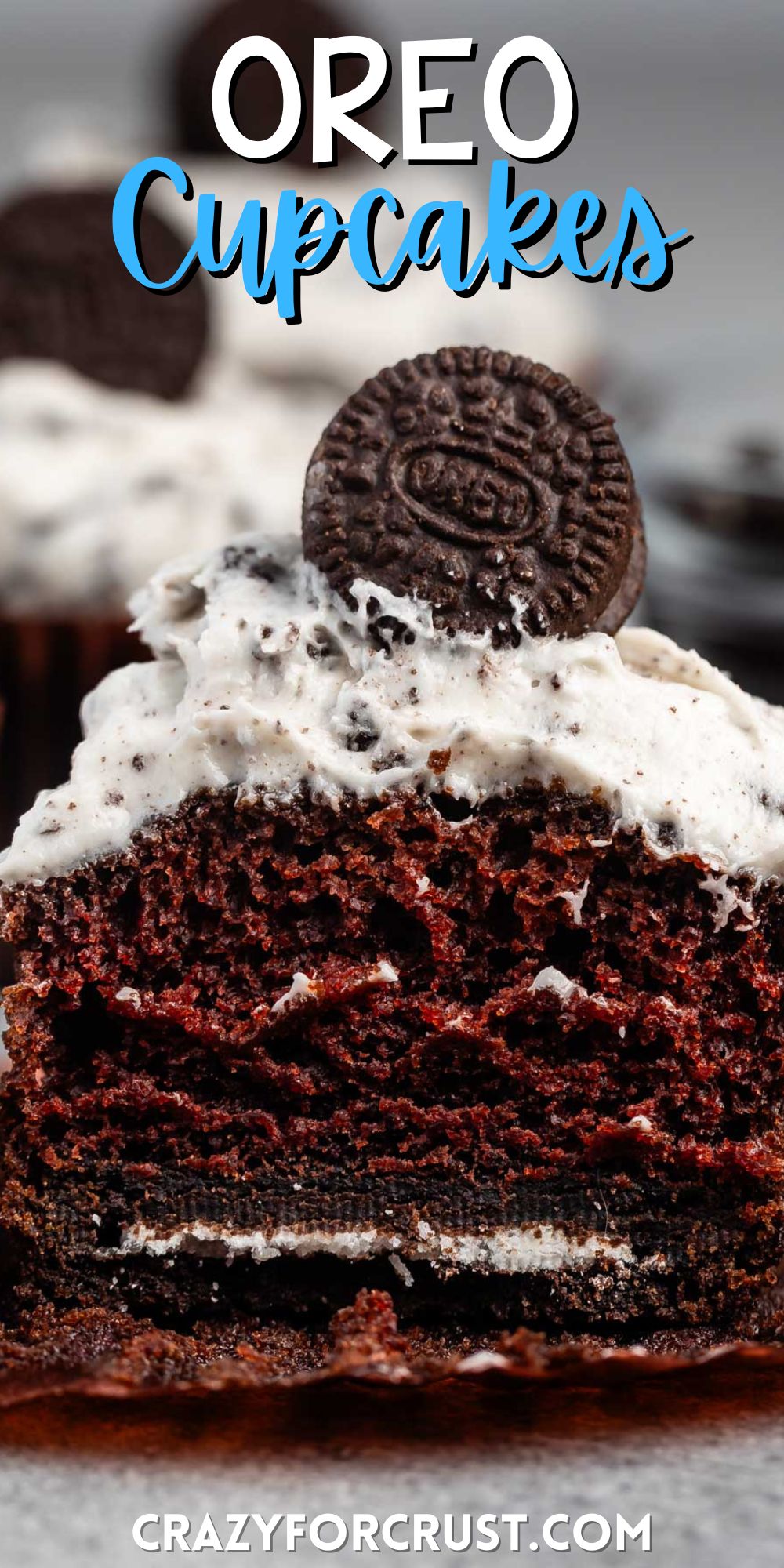 chocolate cupcake split in half with white Oreo frosting and a mini Oreo on top with words on the image.