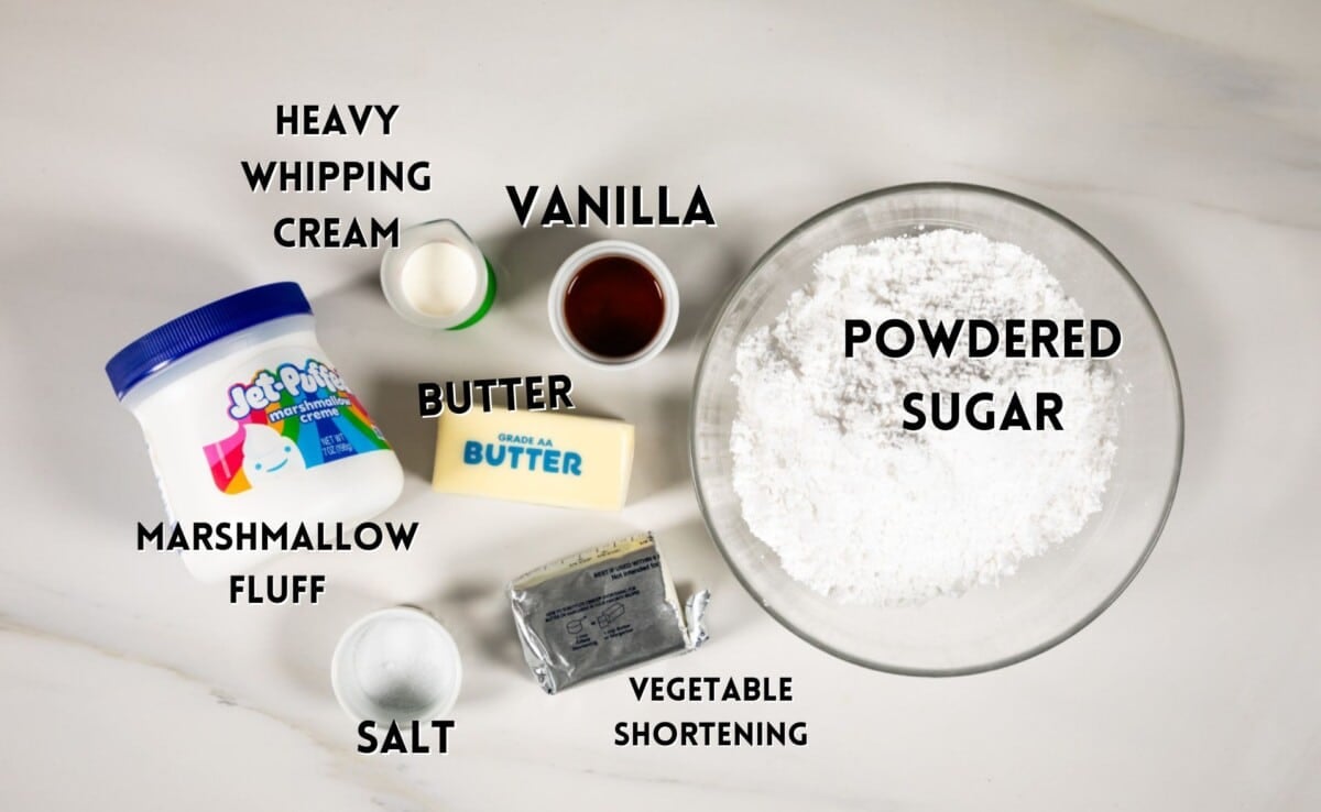 ingredients in oreo frosting laid out on a white marble counter.