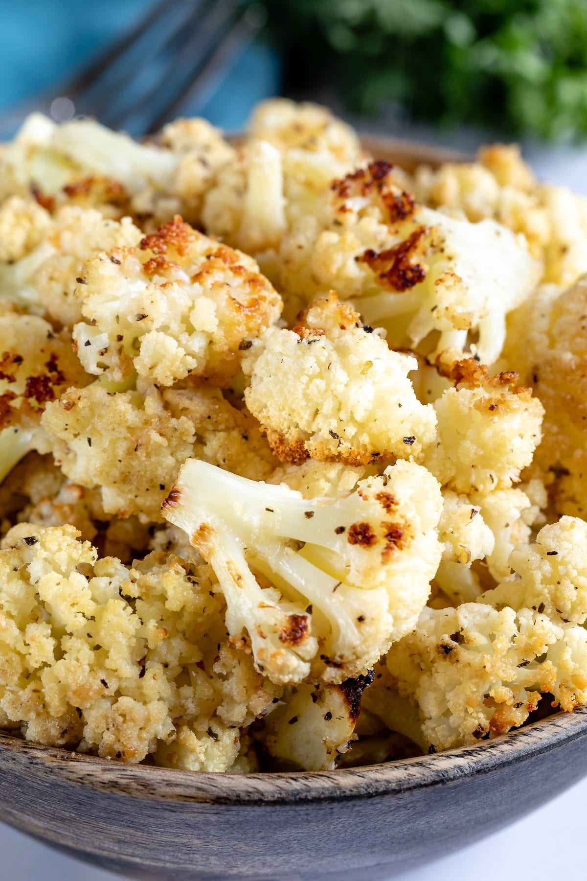 cauliflower in a wood bowl.