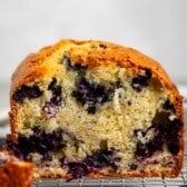 sliced bread with blueberries baked into the center.