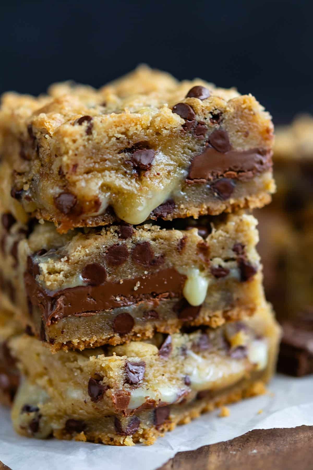 stacked gooey bars with chocolate chips baked into the center.