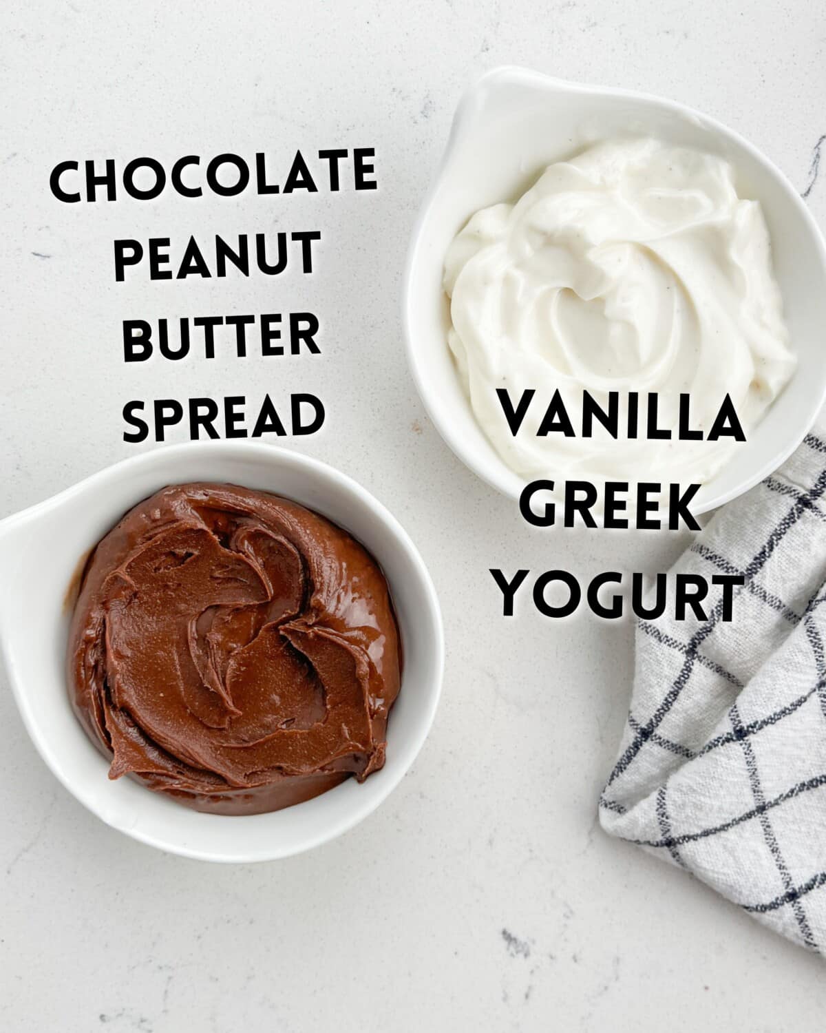 ingredients in chocolate peanut butter dip laid out on a white marble counter.