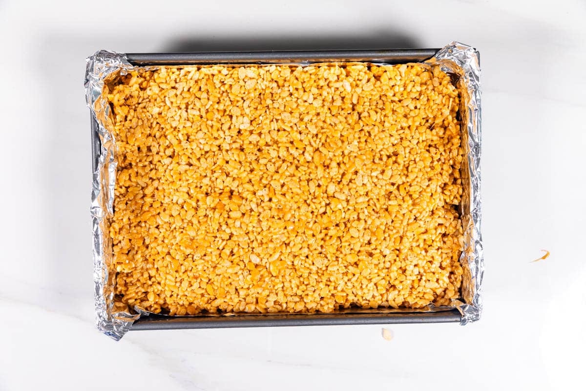 process shot of making peanut butter Rice Krispie treats.