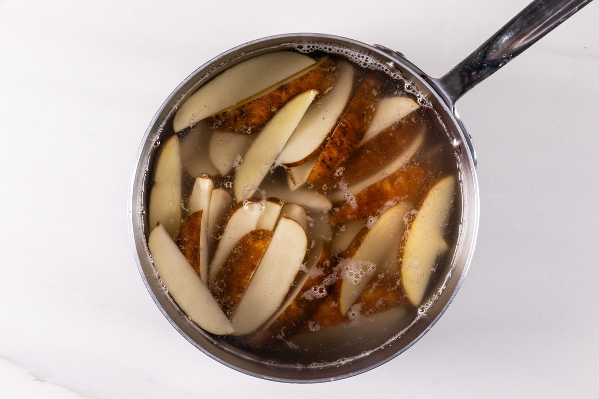 process shot of roasted potatoes being.