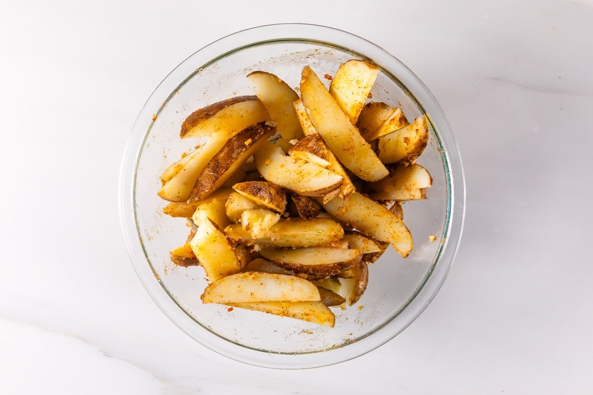 process shot of roasted potatoes being.
