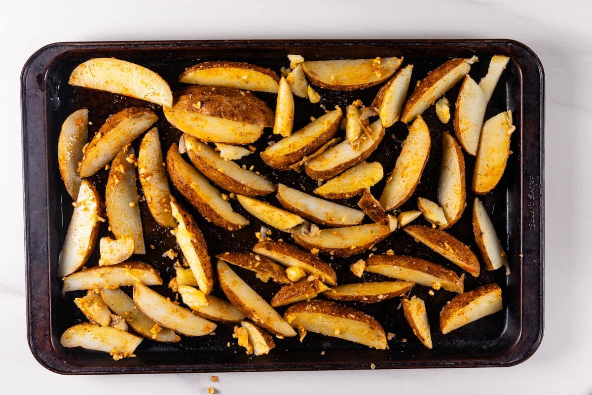 process shot of roasted potatoes being.