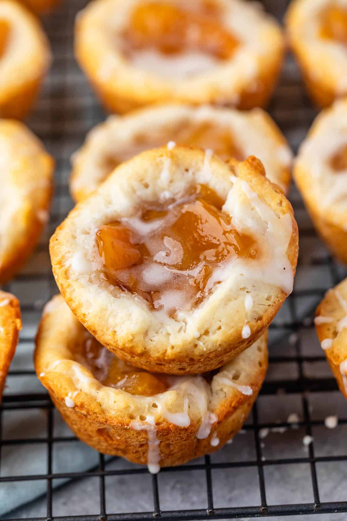 small stacked danishes with peaches baked into the center.