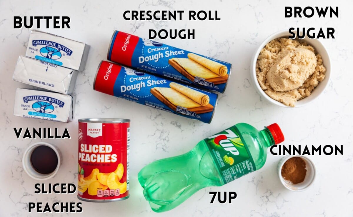 ingredients in peach dumplings laid out on a white marble counter.