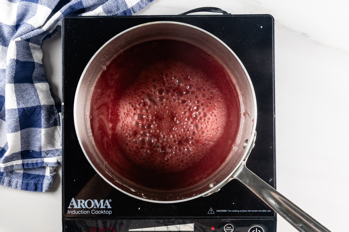 process shot of tart cherry cobbler being made.