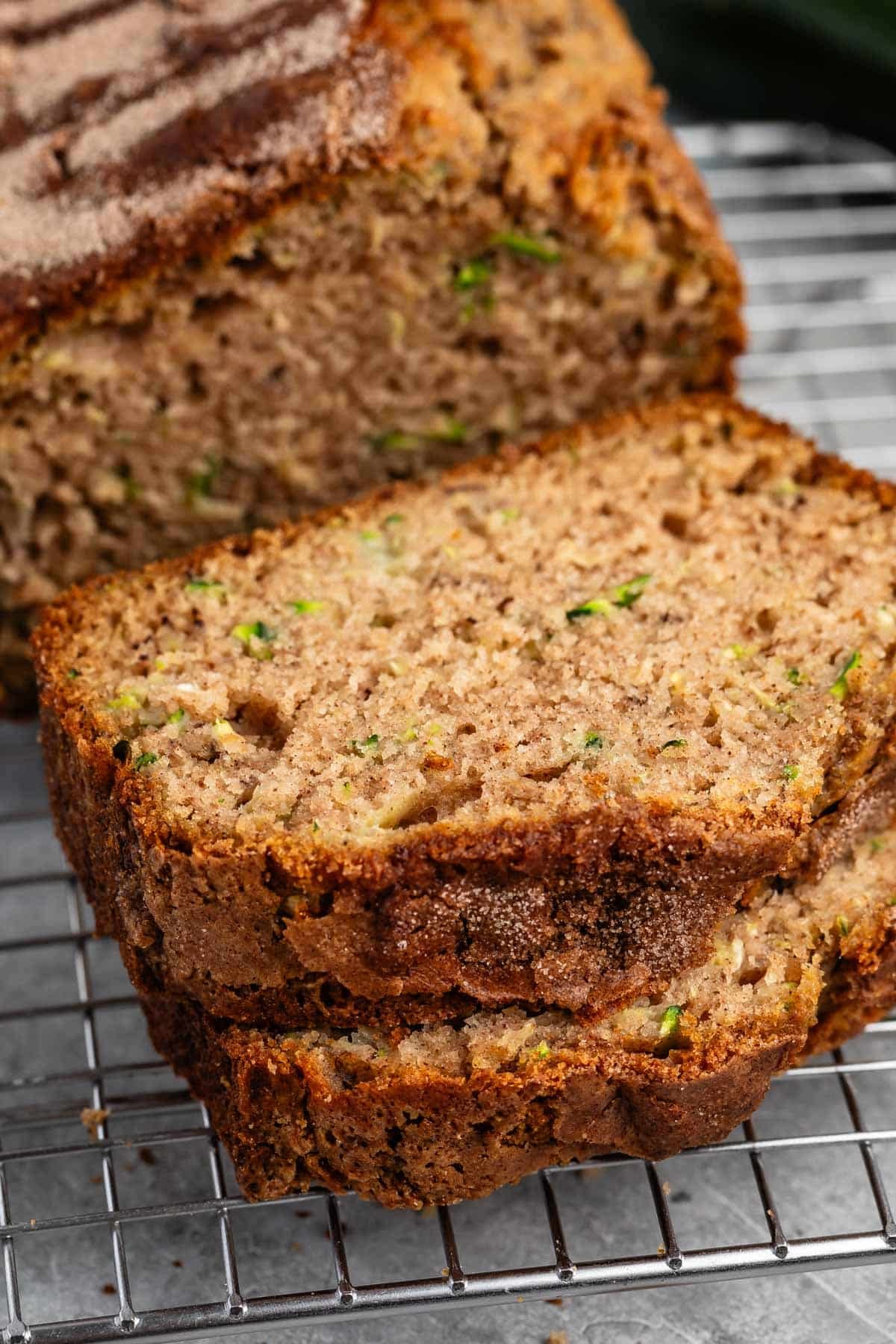 sliced banana bread with shredded zucchini baked inside.