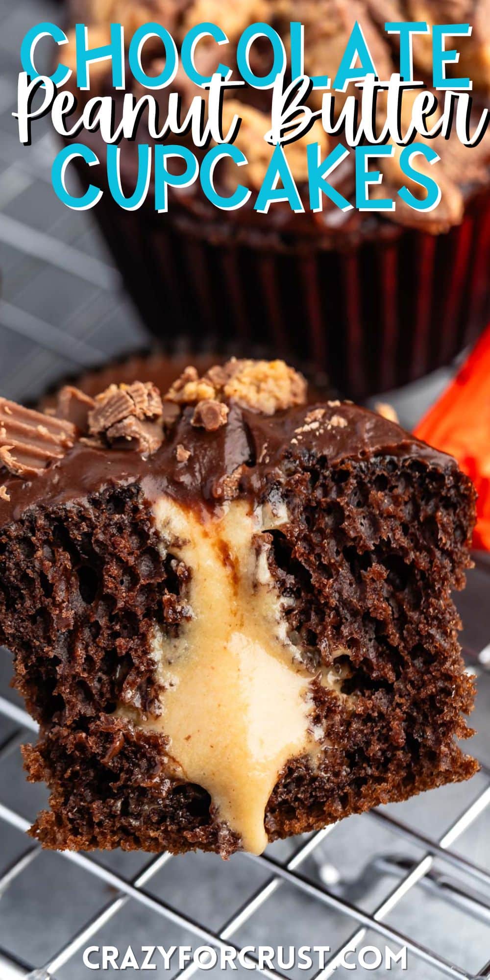 chocolate cupcake cut in half with peanut butter filling pouring out with words on the image.