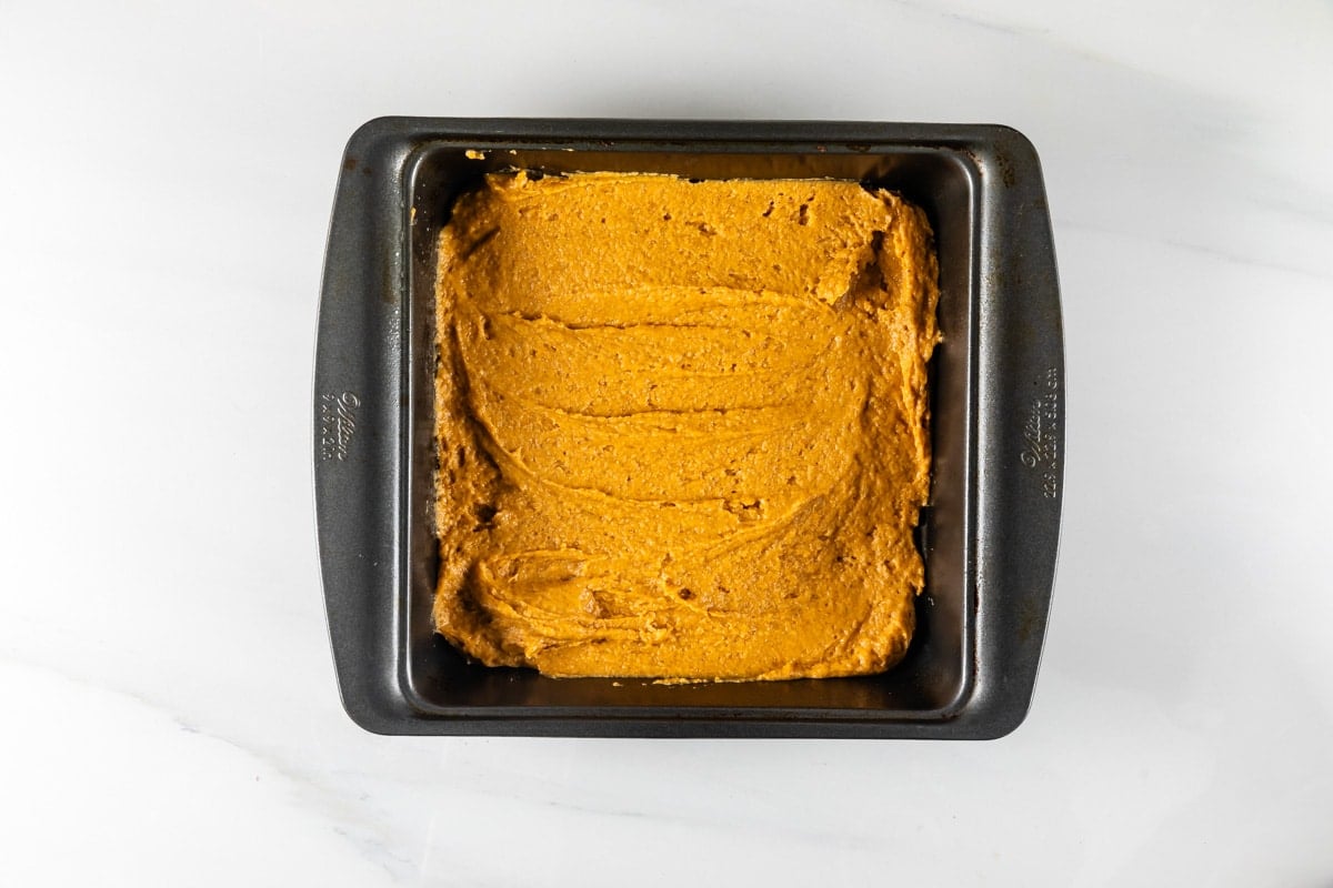 process shot of pumpkin coffee cake being made.
