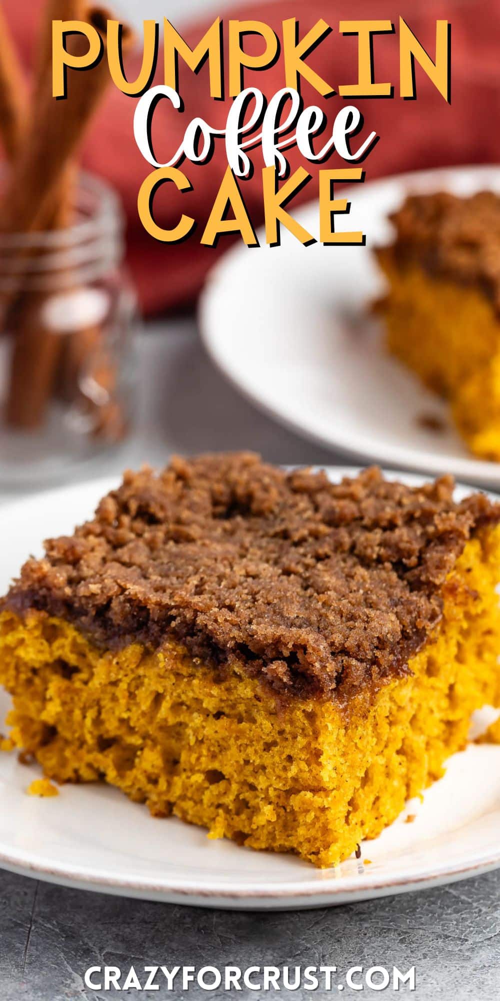 square slice of pumpkin coffee cake on a white plate with words on the image.