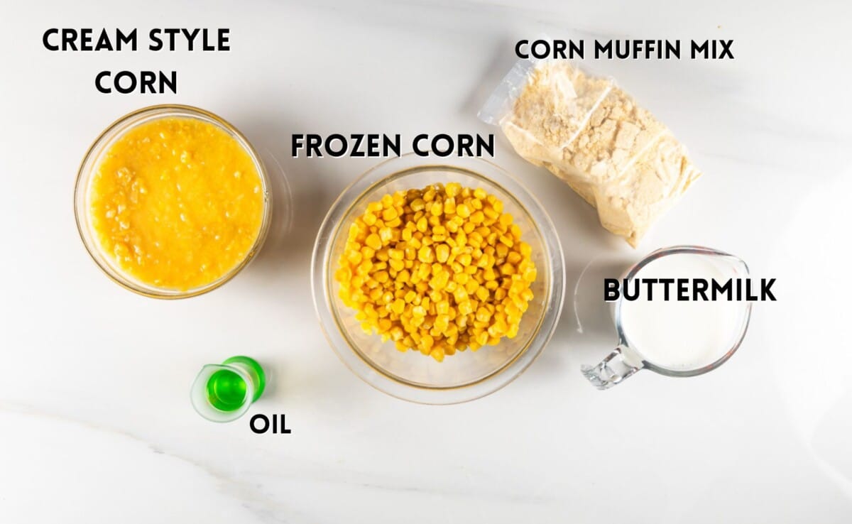 ingredients in corn casserole laid out on a white counter.