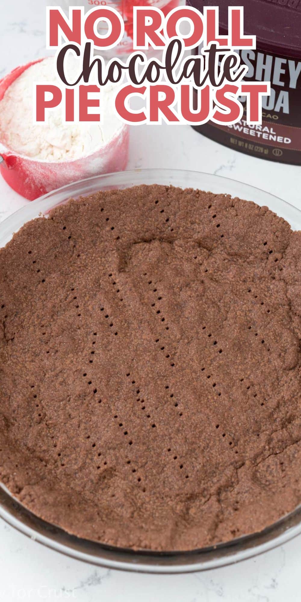 chocolate crust in a glass pan with words on the image.