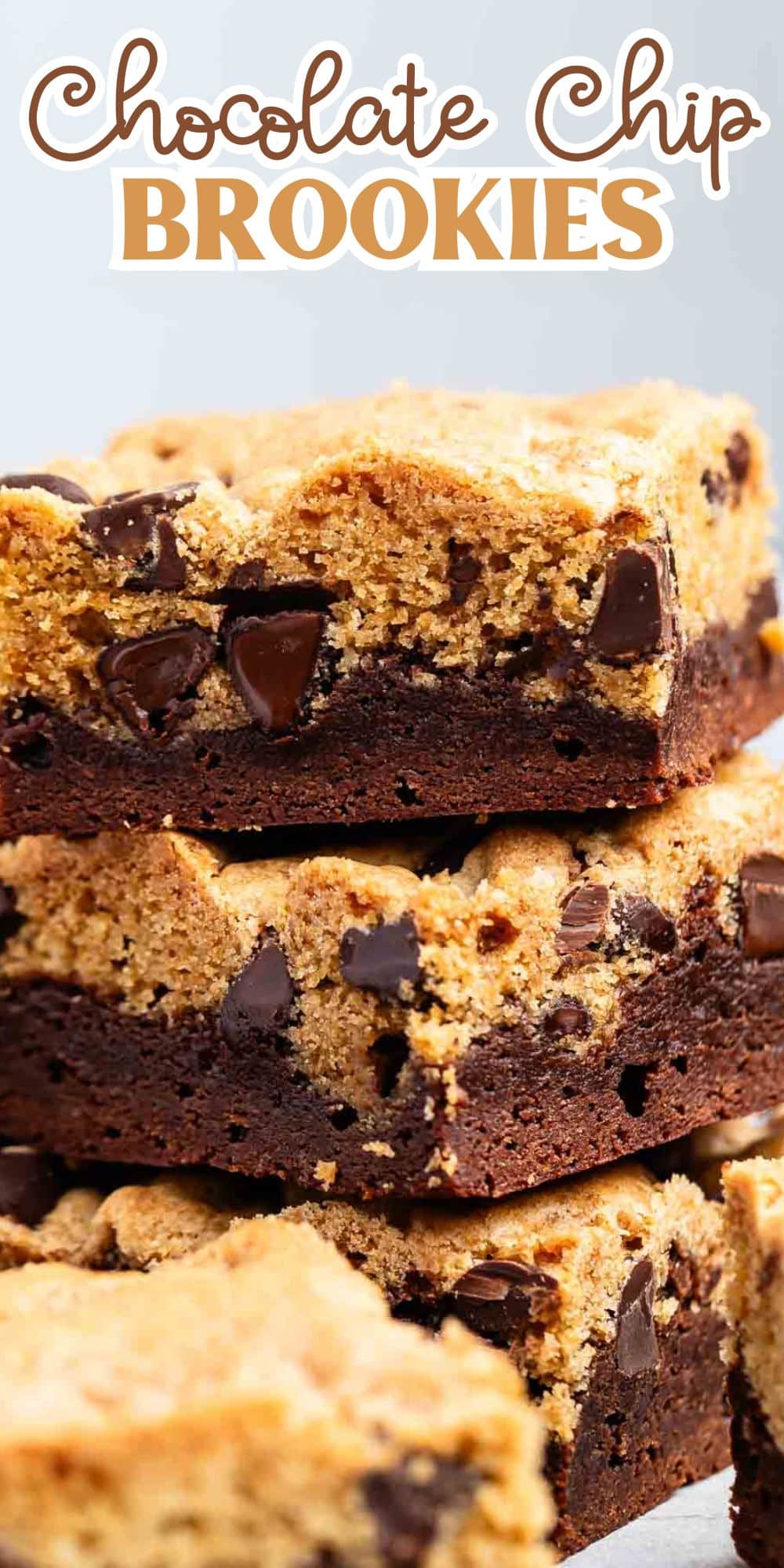 Close-up of stacked chocolate chip brookies. The top layer is a dense cookie with visible chocolate chips, and the bottom layer is a rich brownie. A label at the top reads Chocolate Chip Brookies.