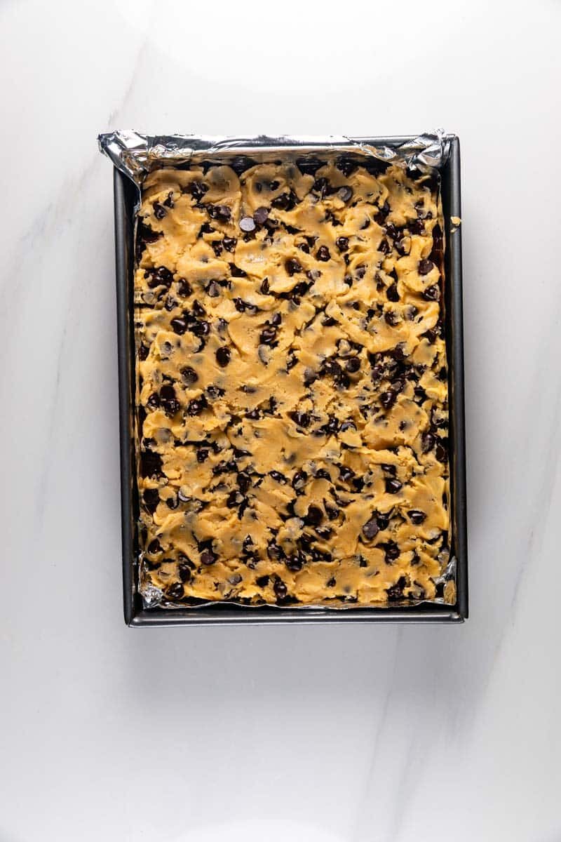 process shot of chocolate chip brownies being made.