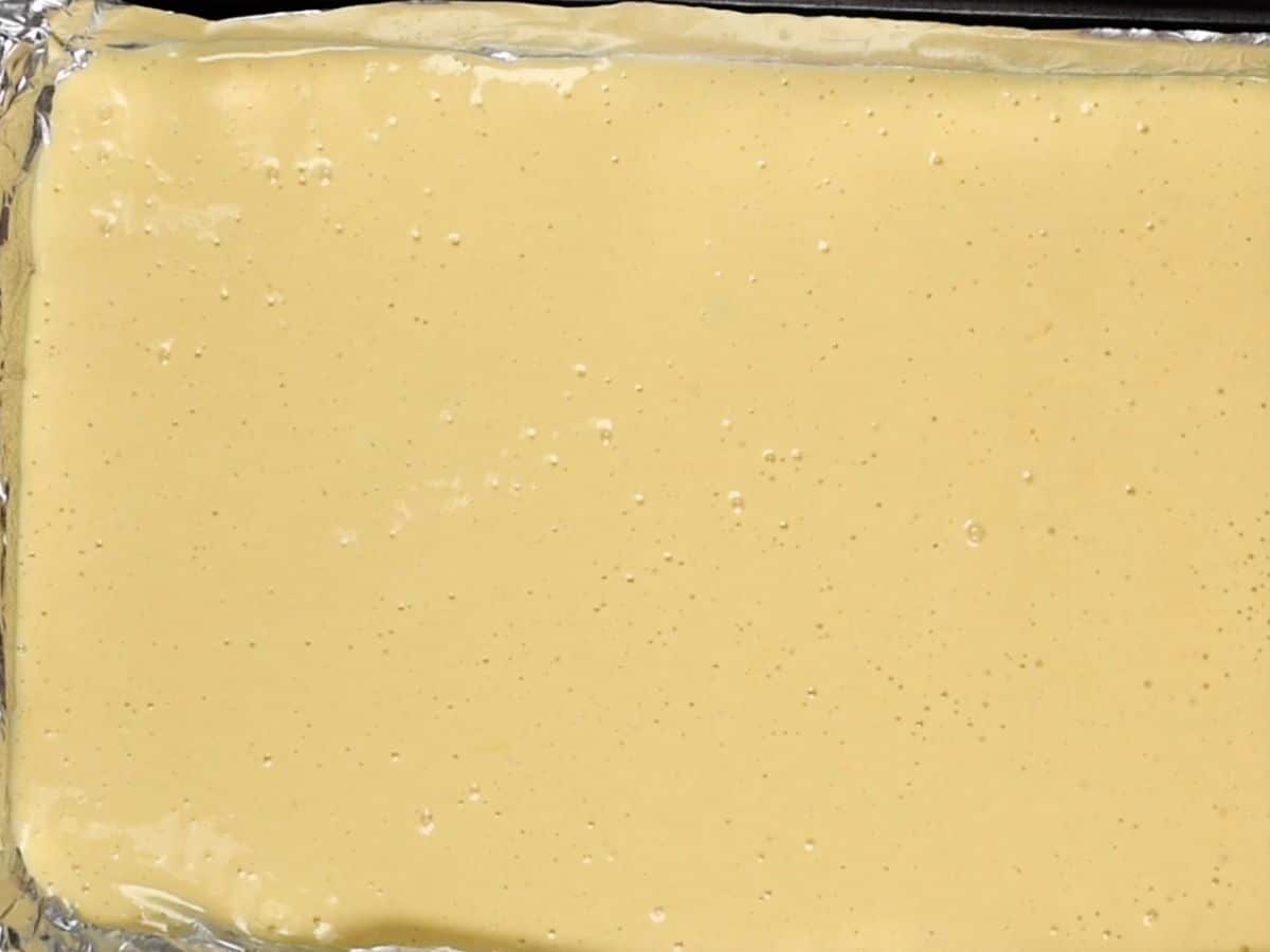 process shot of strawberry cake roll being made.