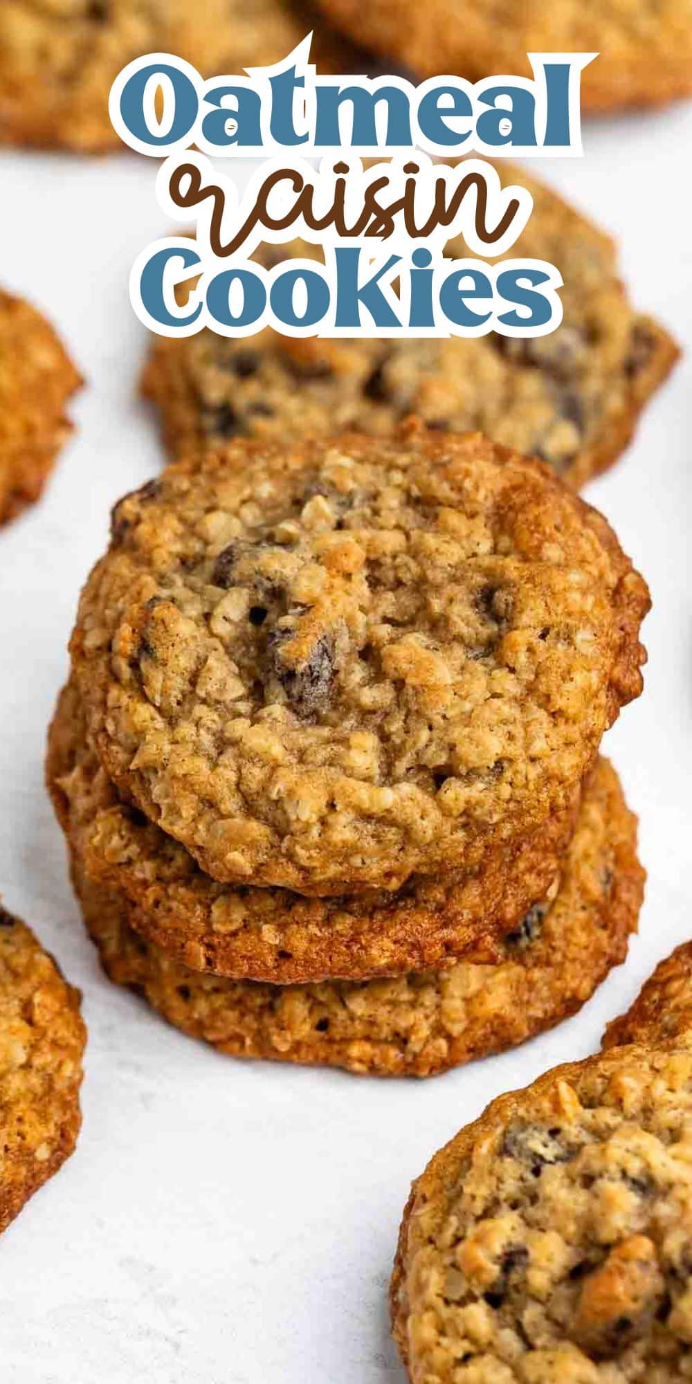 Stack of oatmeal raisin cookies on a light surface, with text above reading Oatmeal Raisin Cookies. The cookies are golden brown with visible raisins and oatmeal bits.