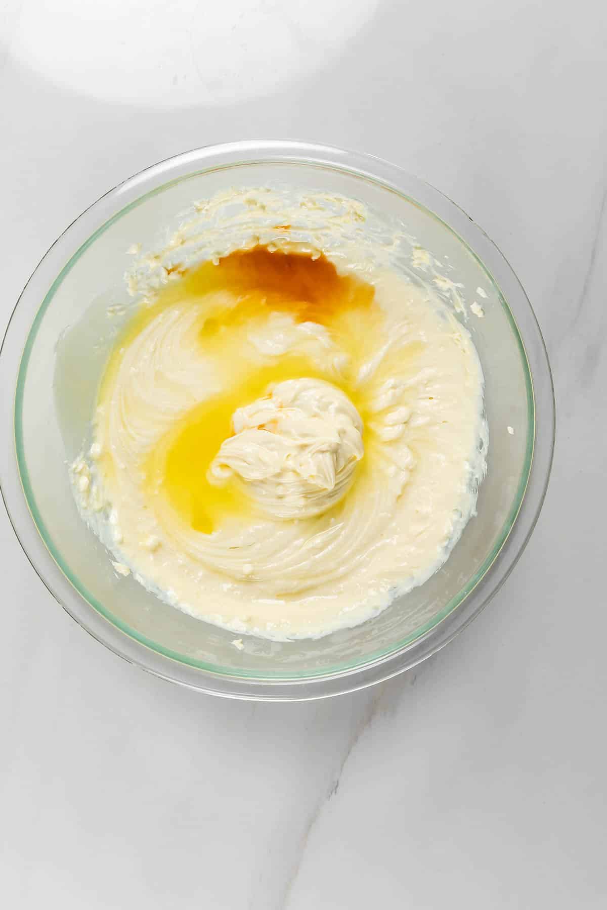 process shot of no bake cheesecake being made.