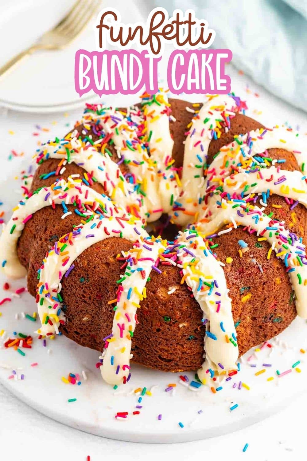A round funfetti Bundt cake topped with white icing drizzles and colorful rainbow sprinkles, displayed on a white plate. The text funfetti Bundt Cake is at the top of the image.