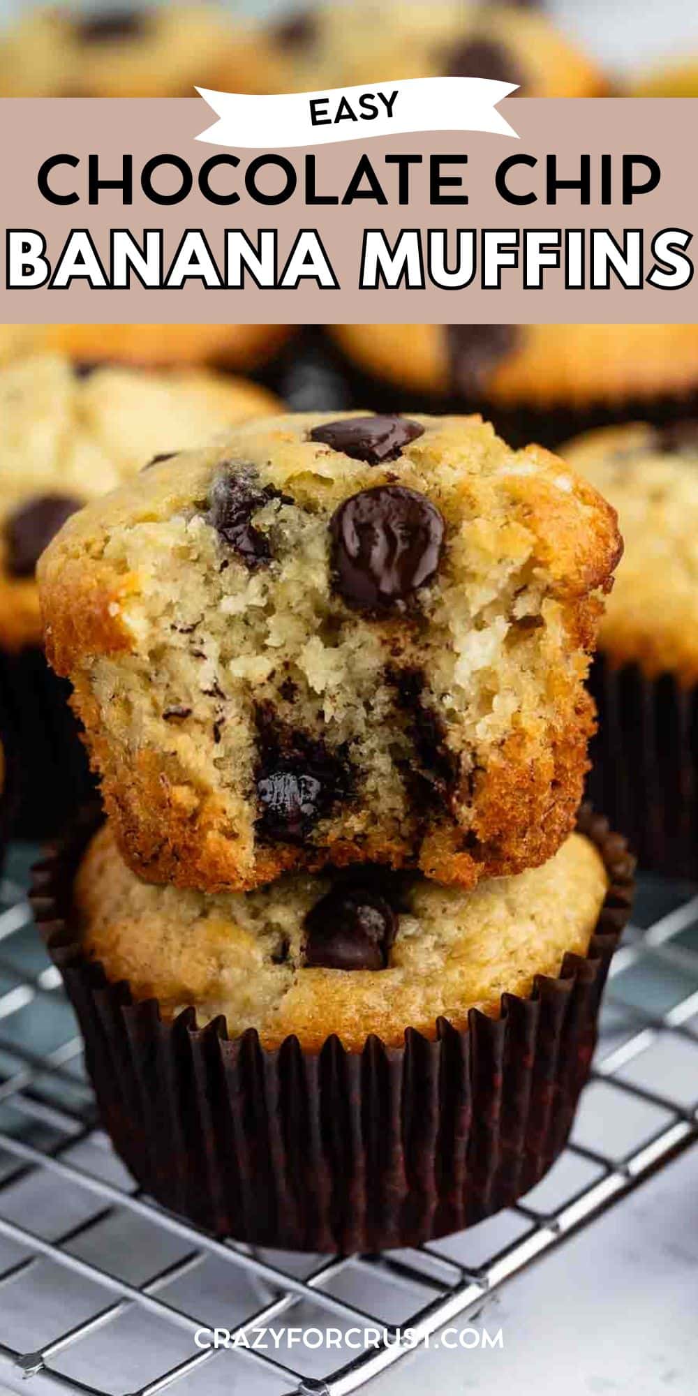 Two chocolate chip banana muffins on a cooling rack, with one muffin cut in half and stacked on top of the other, showing the moist interior and chocolate chips. Text at the top reads Easy Chocolate Chip Banana Muffins.
