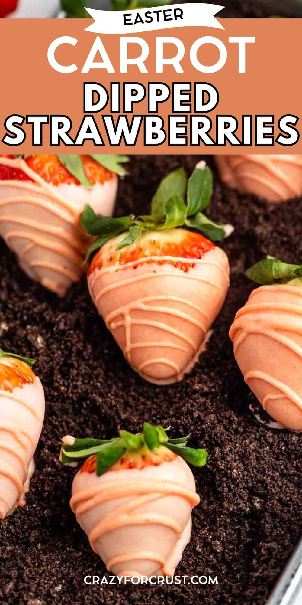 Strawberries dipped in orange-colored chocolate and decorated to look like carrots, arranged on a bed of crushed chocolate cookies. Text reads “Easter Carrot Dipped Strawberries.”.