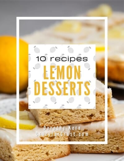 A close-up of lemon dessert bars with icing and lemon slices, overlaid with text: 10 recipes Lemon Desserts. Dorothy Kern, CrazyforCrust.com. A whole lemon is visible in the background.
