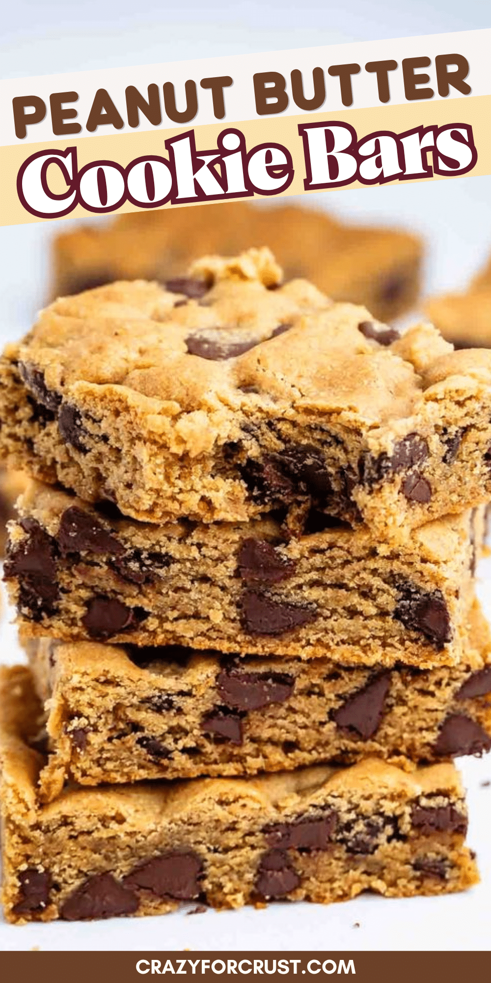 A stack of thick peanut butter cookie bars with chocolate chips, set against a white background. The text reads Peanut Butter Cookie Bars and crazyforcrust.com.