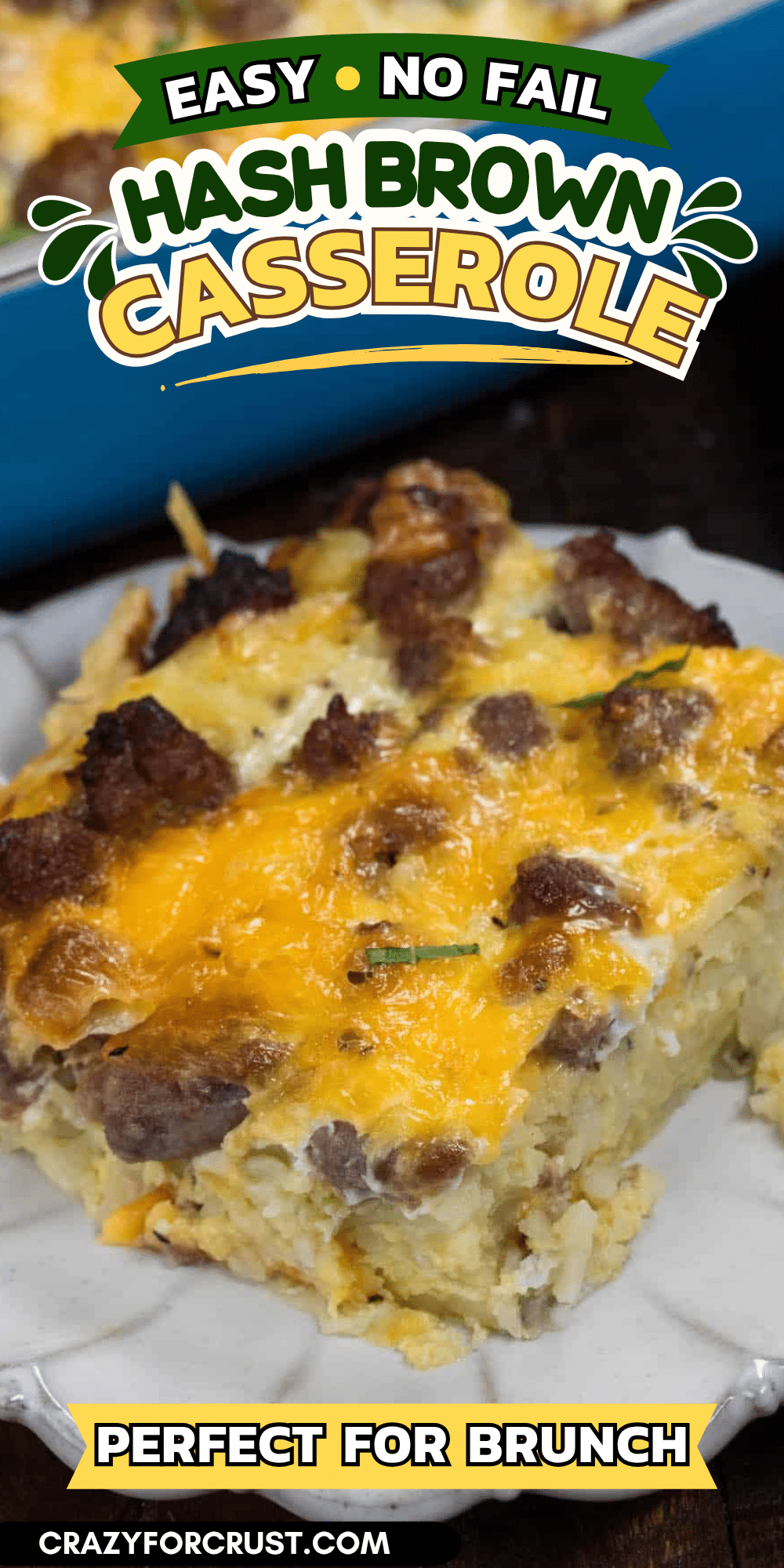 A slice of cheesy hash brown casserole with sausage on a white plate, captioned Easy No Fail Hash Brown Casserole and Perfect for Brunch.