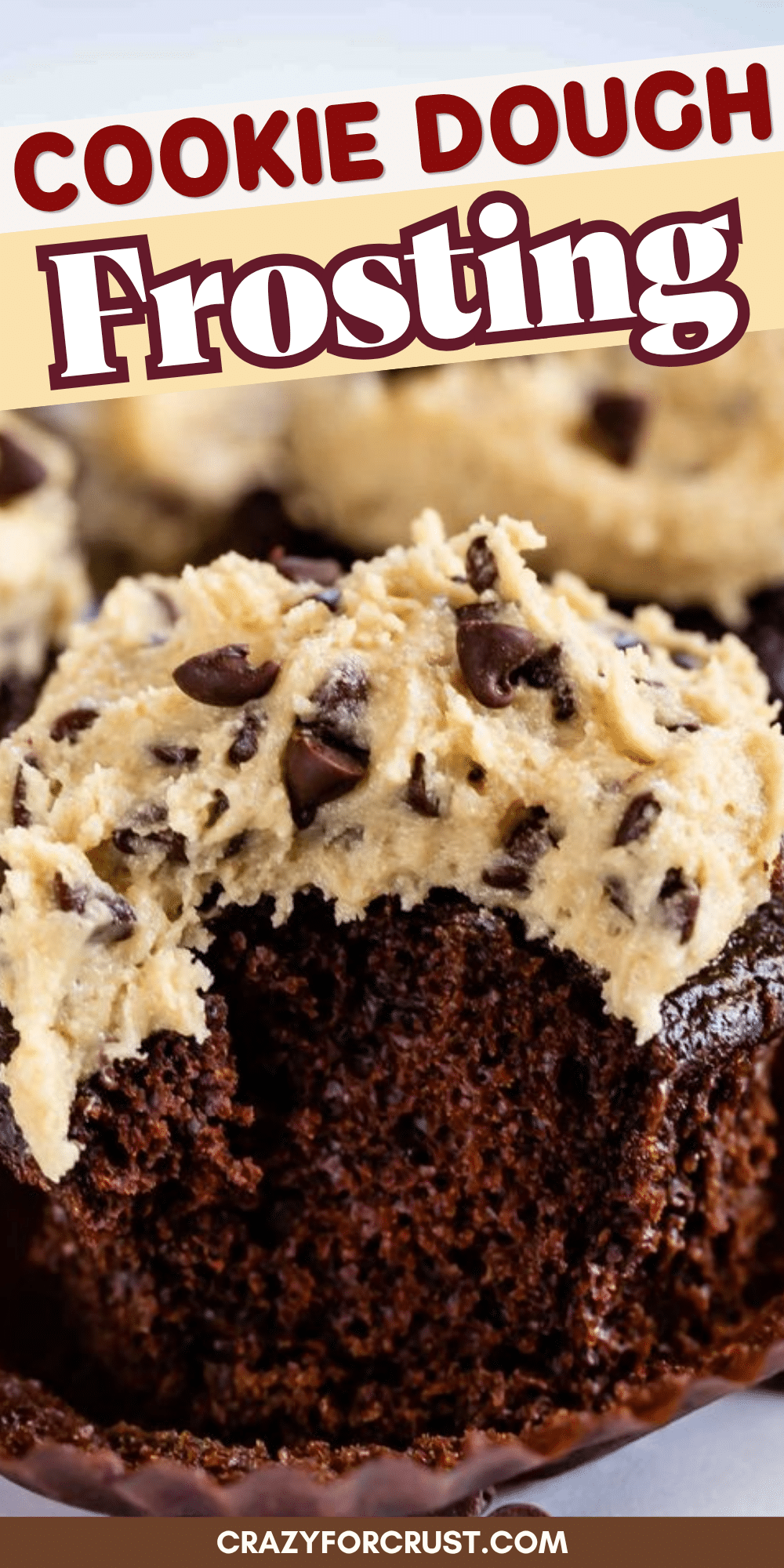 A chocolate cupcake topped with cookie dough frosting and mini chocolate chips, with a bite taken out. Text reads COOKIE DOUGH Frosting and CRAZYFORCRUST.COM at the bottom.