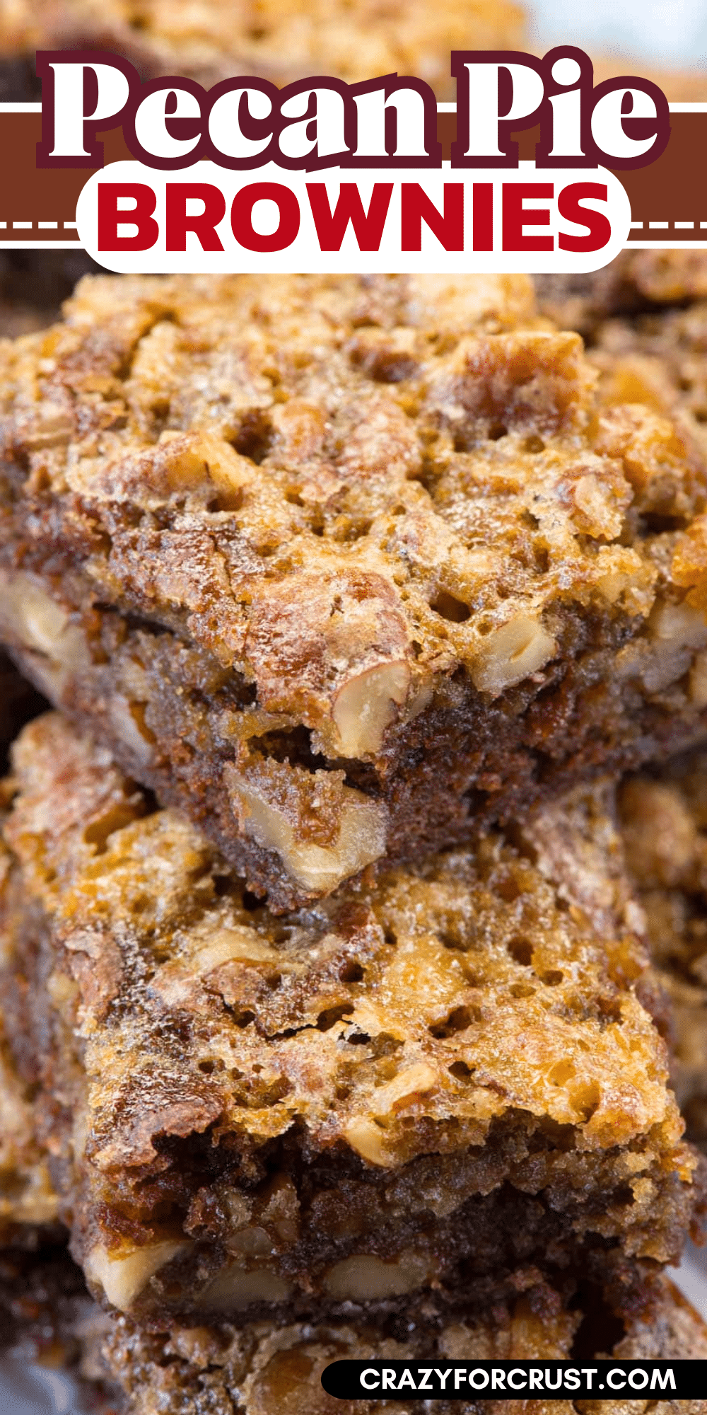 Close-up of gooey pecan pie brownies stacked on each other, showing a nutty, golden-brown top and dense brownie layers. The text reads Pecan Pie Brownies with a website link at the bottom.