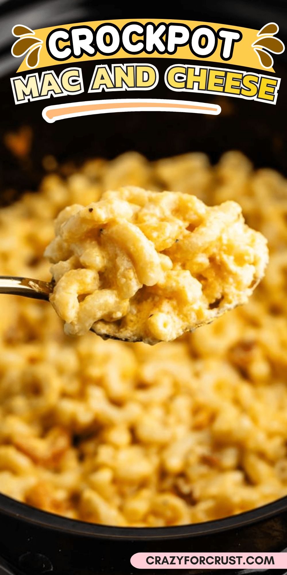 A spoonful of creamy macaroni and cheese held over a slow cooker, with a graphic overlay reading CROCKPOT MAC AND CHEESE and CRAZYFORCRUST.COM.