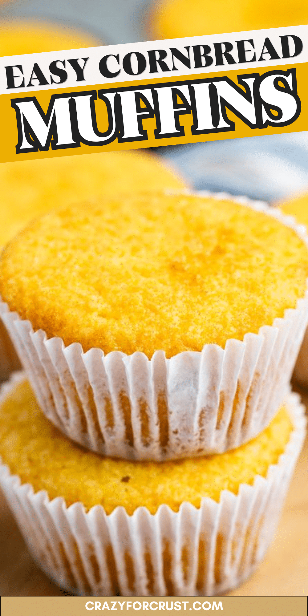 Two golden yellow cornbread muffins in paper liners, with the text EASY CORNBREAD MUFFINS at the top.